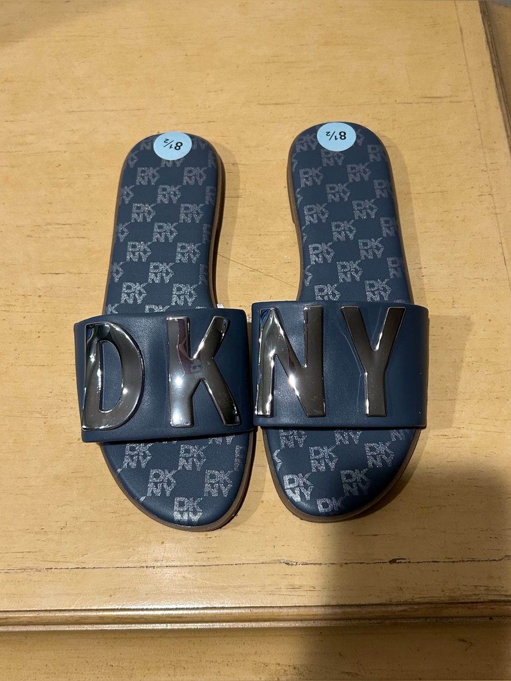 DKNY women’s waltz  slip on blue and  silver flat sandals in size 8.5